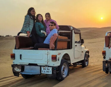 Experience thrilling desert jeep safaris at Suryansh Wellness Desert Resort and witness magical sunset views across the golden sand dunes of Rajasthan.